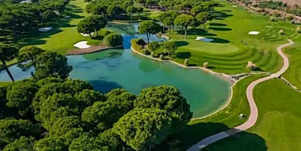 Aerial view of Belek golf courses and luxury hotels during a helicopter transfer from Antalya Airport