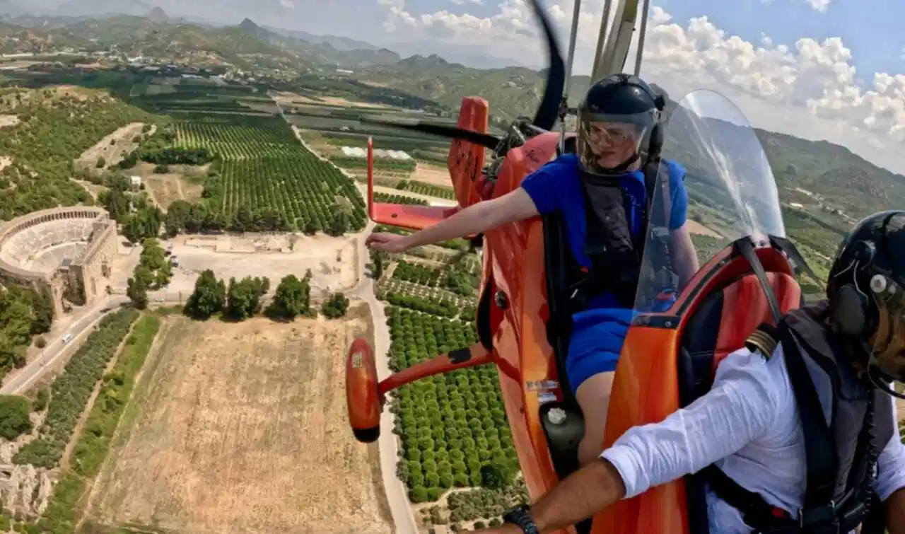 Gyrocopter flying above Aspendos ancient theater during Antalya gyrocopter tour with zirveadam.top 
