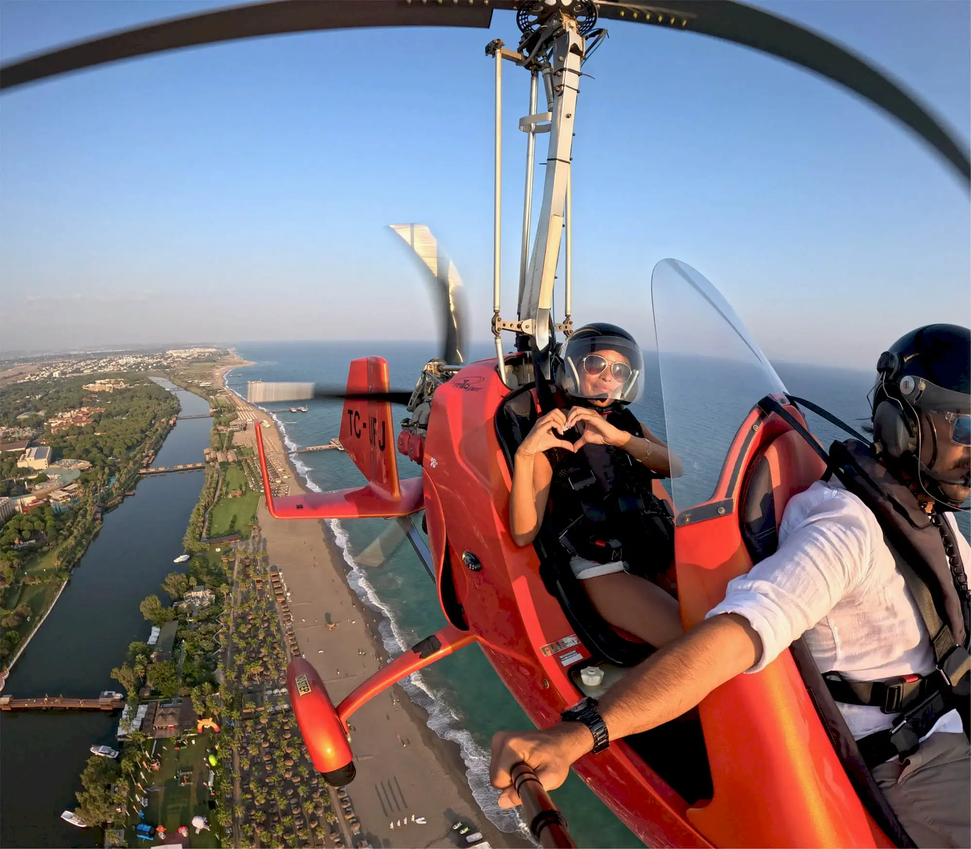 Aspendos Premium Gyrocopter Tour-Gyrocopter Flight Passenger Making Heart Gesture